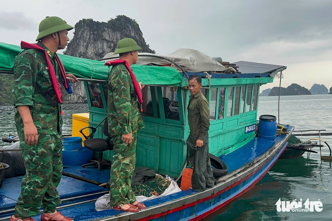 Đưa 7.500 người dân lên bờ, giúp dân chằng chống nhà cửa trước bão số 3 Wipha - Ảnh 7.