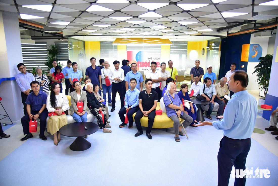 50 bạn đọc lần đầu tham quan tòa soạn báo Tuổi Trẻ - Ảnh 5.