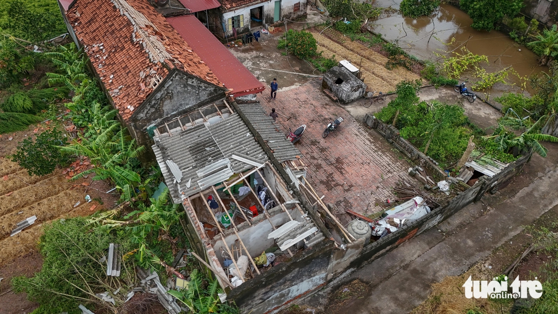 Khung cảnh tan hoang sau cơn lốc xoáy ở Ninh Bình - Ảnh 7.