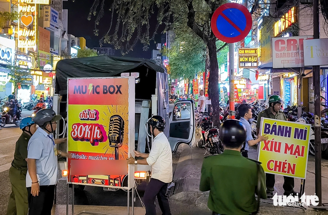 lấn chiếm vỉa hè - Ảnh 1.