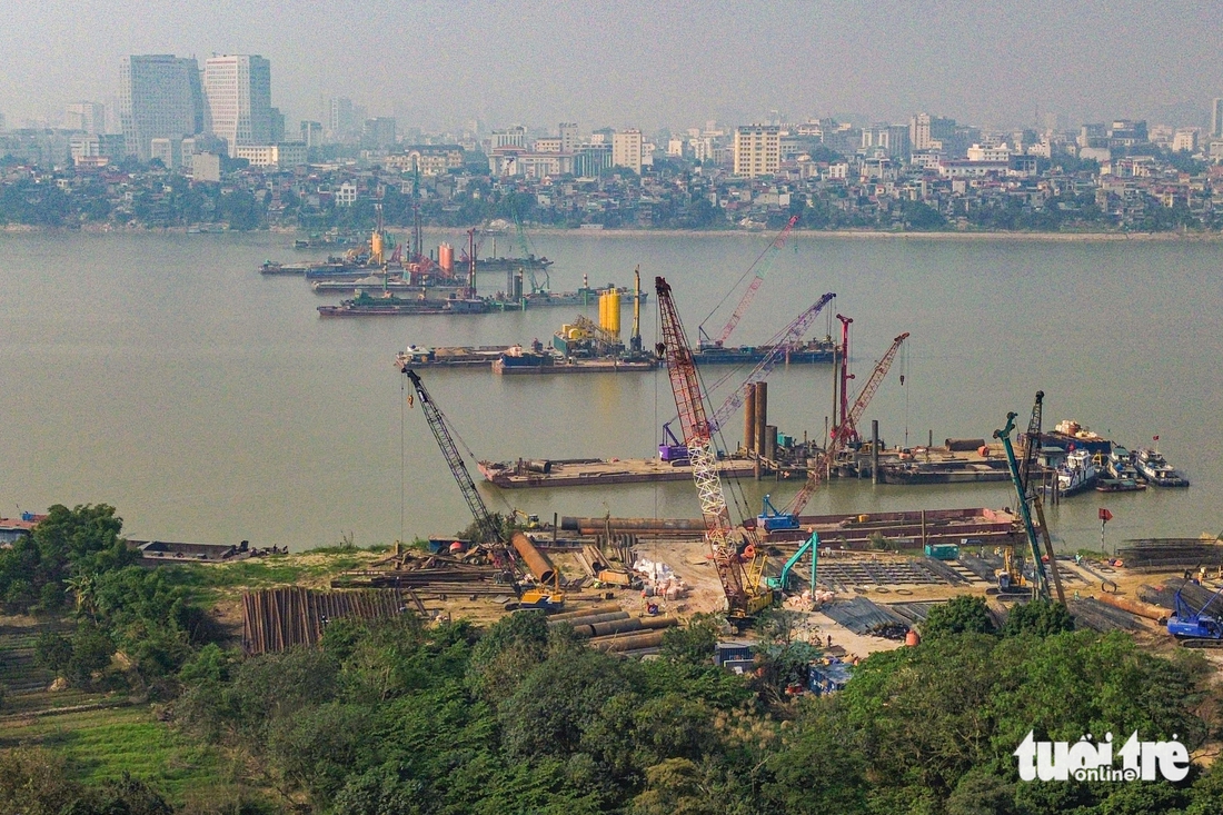 Công trường thi công cây cầu biểu tượng gần 16.000 tỉ ở trung tâm Hà Nội - Ảnh 2.