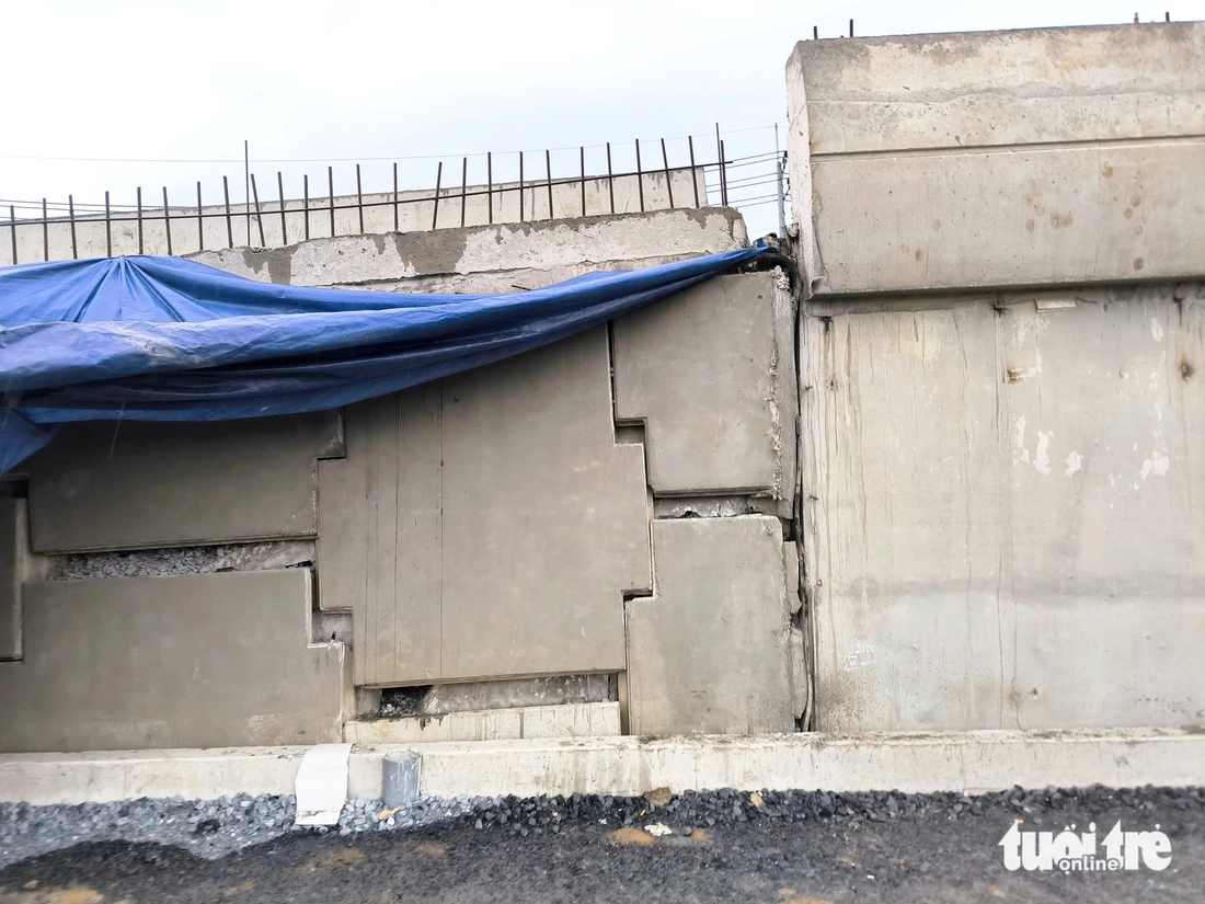 Cận ngày thông xe, tường chắn nhánh cầu vành đai 3 TP.HCM phải dỡ ra để thi công lại - Ảnh 10.