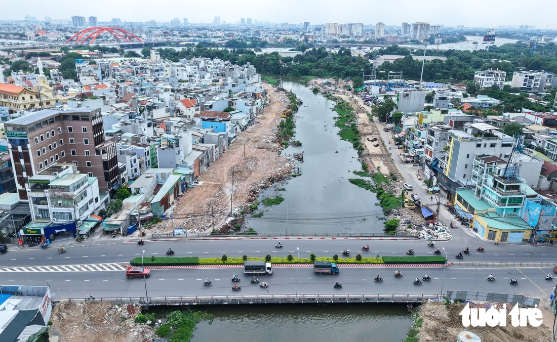 Rạch Xuyên Tâm thông thoáng mặt bằng, các gói thầu tăng tốc thi công - Ảnh 7.