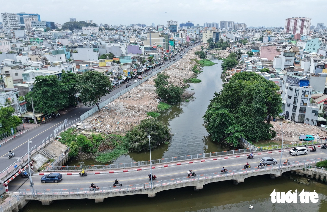 Rạch Xuyên Tâm thông thoáng mặt bằng, các gói thầu tăng tốc thi công - Ảnh 11.