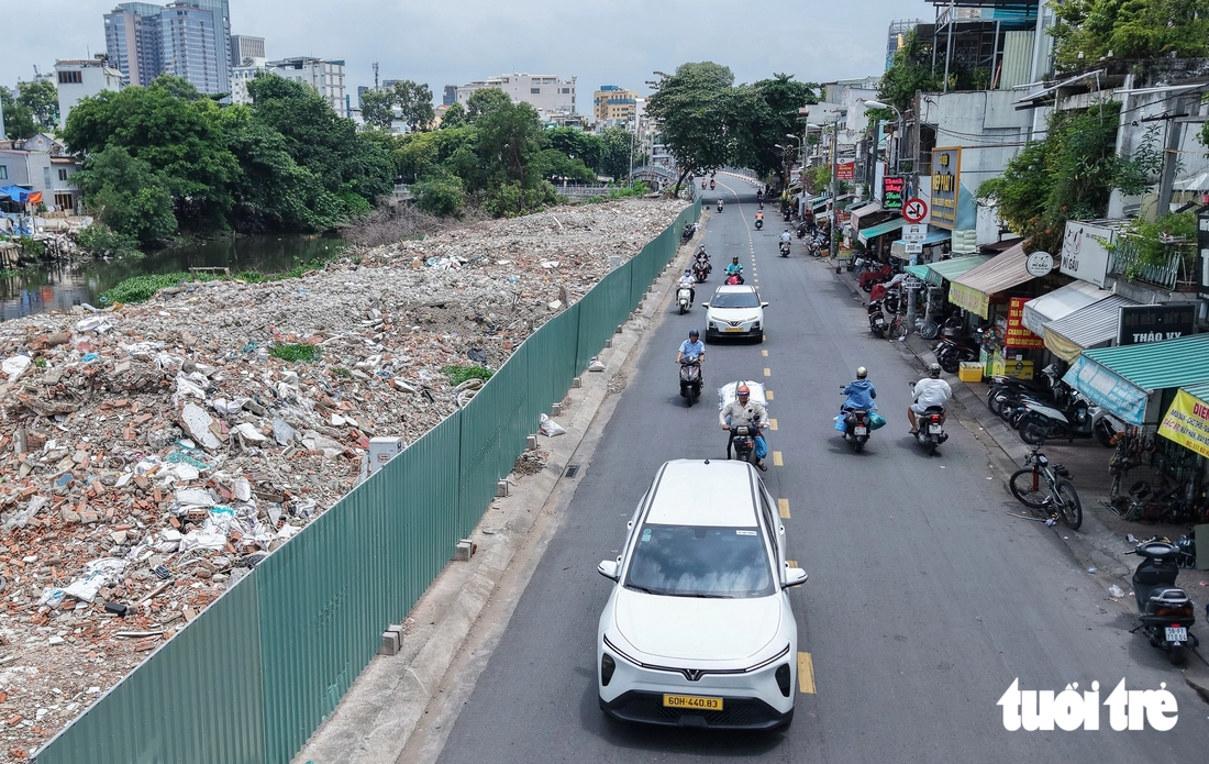 Rạch Xuyên Tâm thông thoáng mặt bằng, các gói thầu tăng tốc thi công - Ảnh 12.