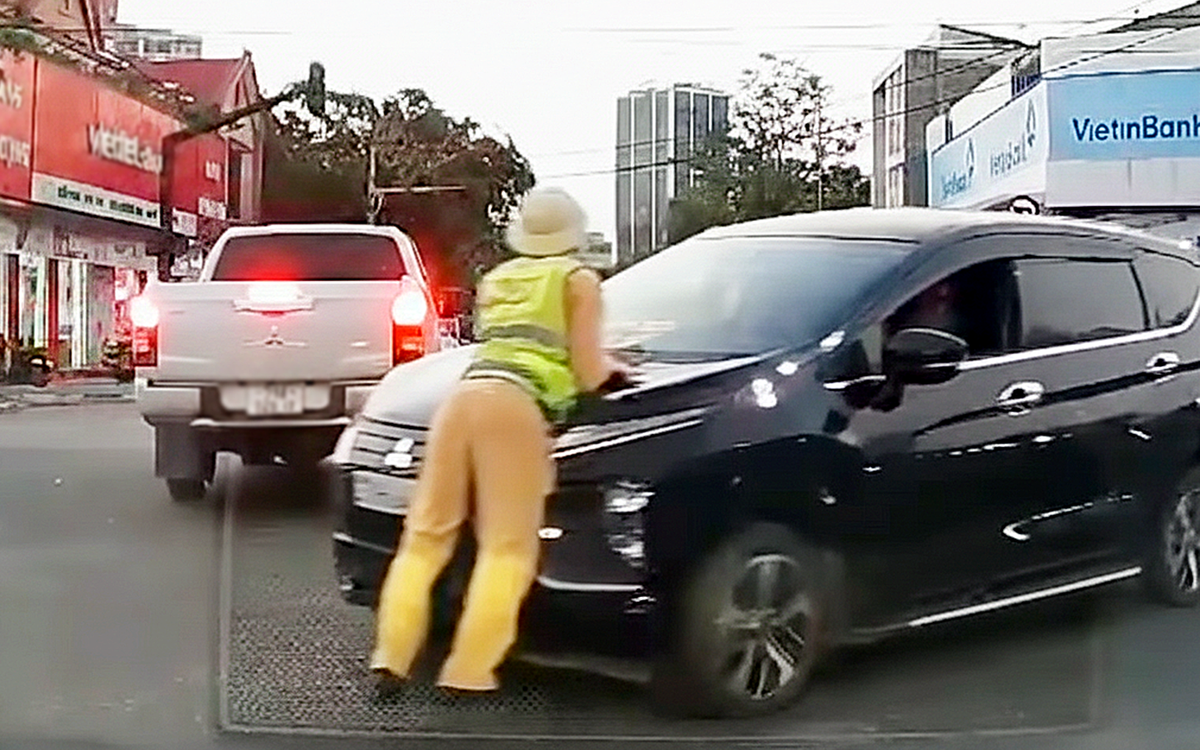 Thiếu tá cảnh sát giao thông bị hất lên nắp capô giờ tan tầm