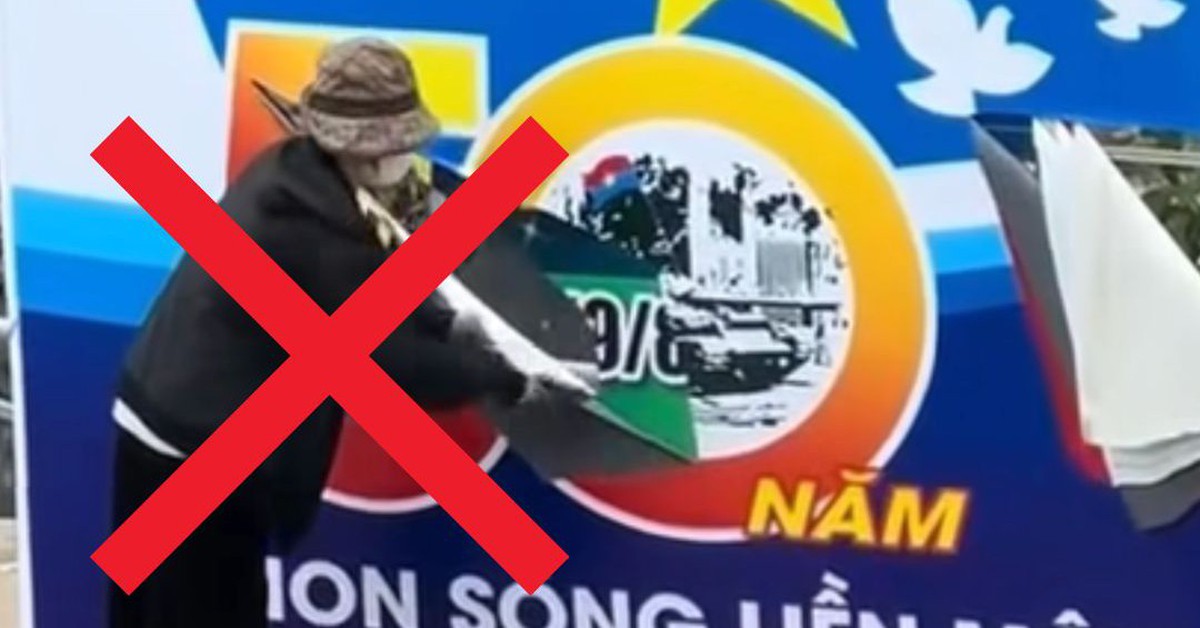 Công an xác minh người phụ nữ ở Hà Nội cầm dao rạch biển pa nô chào mừng ngày thống nhất đất nước