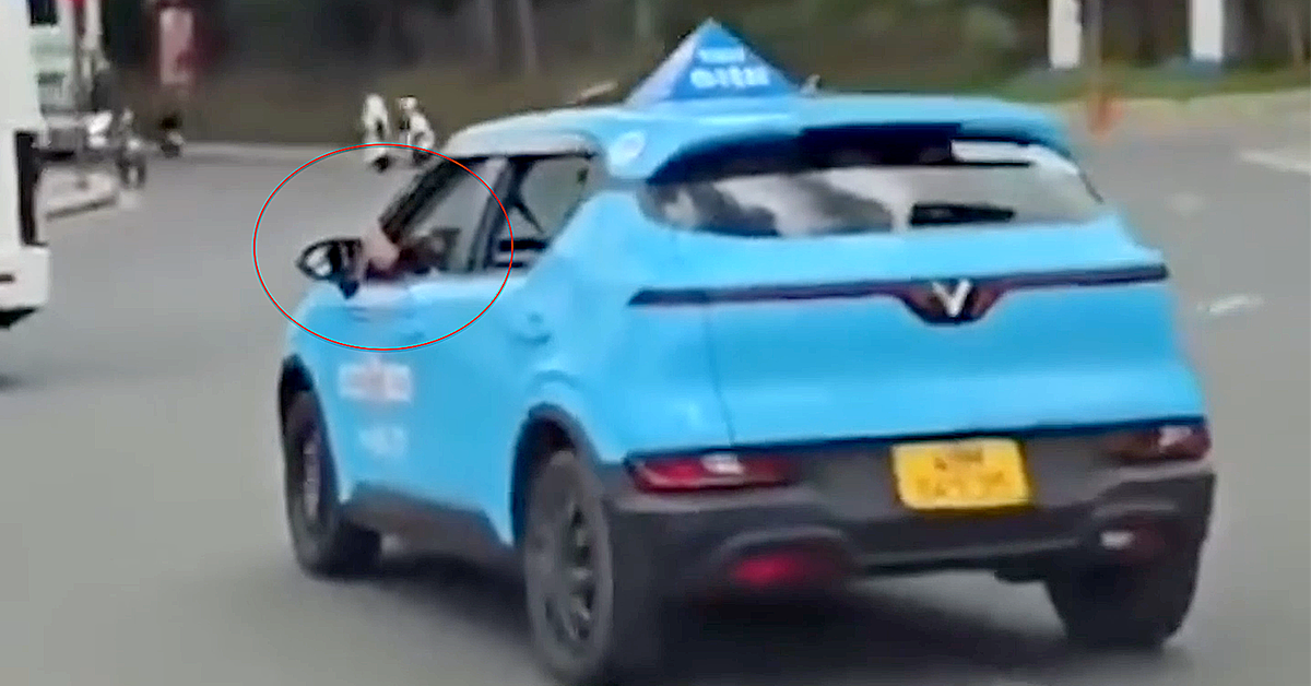 Tài xế ở Đà Lạt vừa lái xe vừa gác chân lên cửa kính