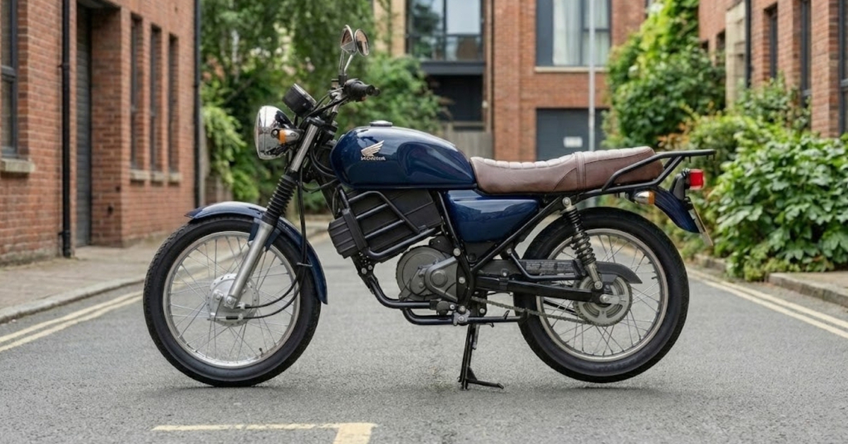 Honda làm xe máy điện giá rẻ, pin có thể tháo rời đặt trong 'bình xăng'