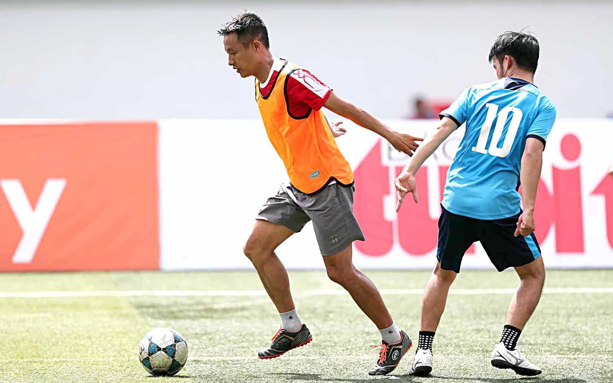 Vietnamese Workers Compete in Football Tournament Amidst Busy Schedules