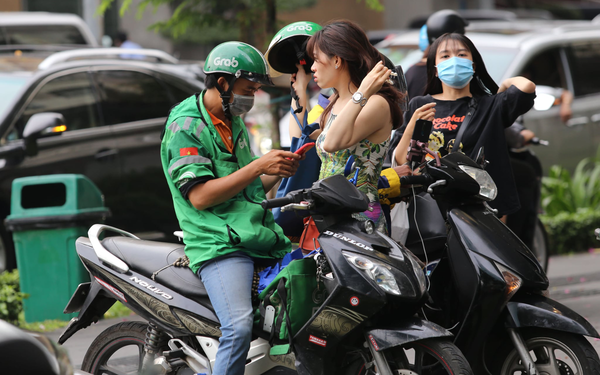 Tỷ lệ phân chia doanh thu cuốc xe giữa Grab và tài xế