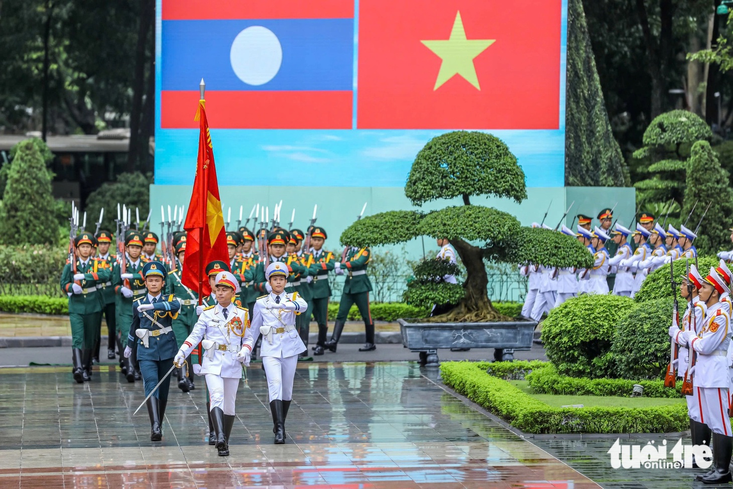 21 phát đại bác trong lễ đón trọng thể Tổng Bí thư, Chủ tịch nước Lào - Ảnh 7.