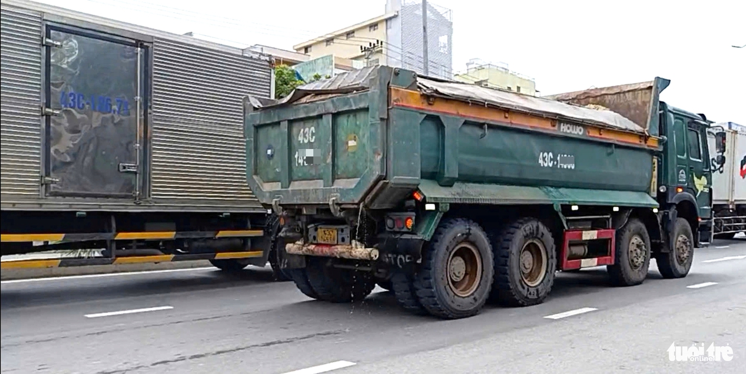 Ai là ‘thủ phạm’ của những vết bùn, đất nhem nhuốc trên đường phố Đà Nẵng? - Ảnh 6.
