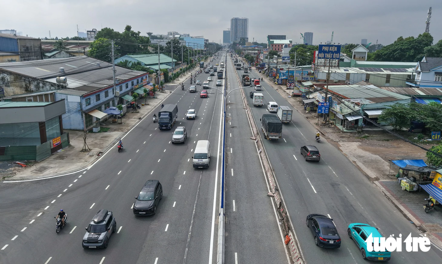 Cận cảnh diện mạo mới nhất của Quốc lộ 13 qua Bình Dương cũ sau hơn 4 năm mở rộng - Ảnh 1.