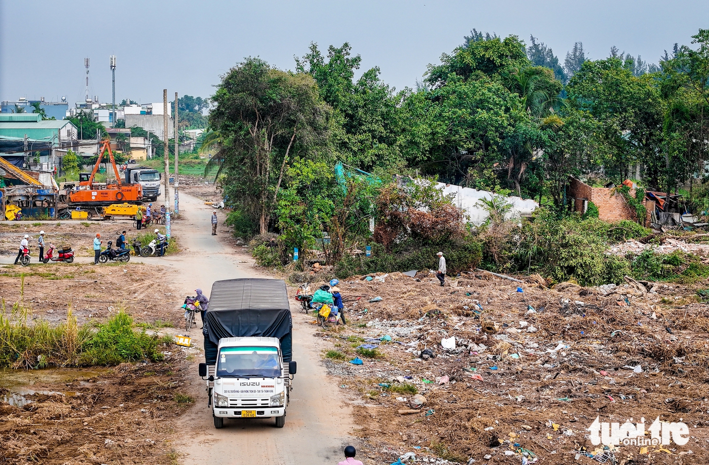 2,7km vành đai 2 TP.HCM tái khởi động, máy móc rầm rộ sau hơn 5 năm chờ đợi - Ảnh 9.