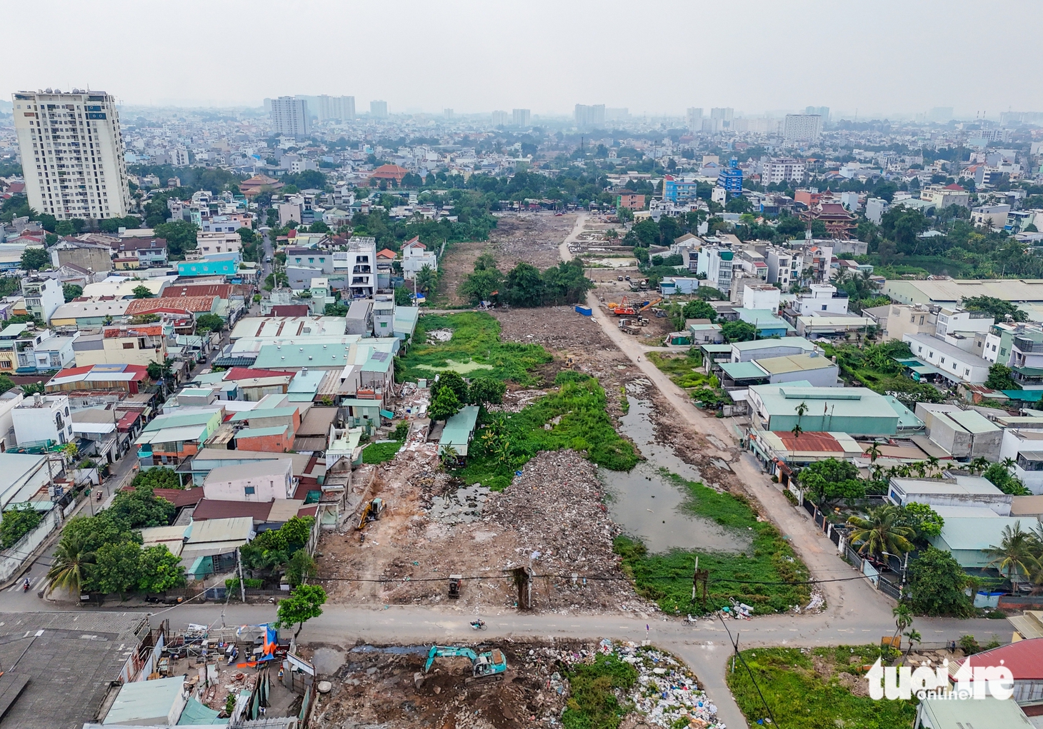 2,7km vành đai 2 TP.HCM tái khởi động, máy móc rầm rộ sau hơn 5 năm chờ đợi - Ảnh 12.