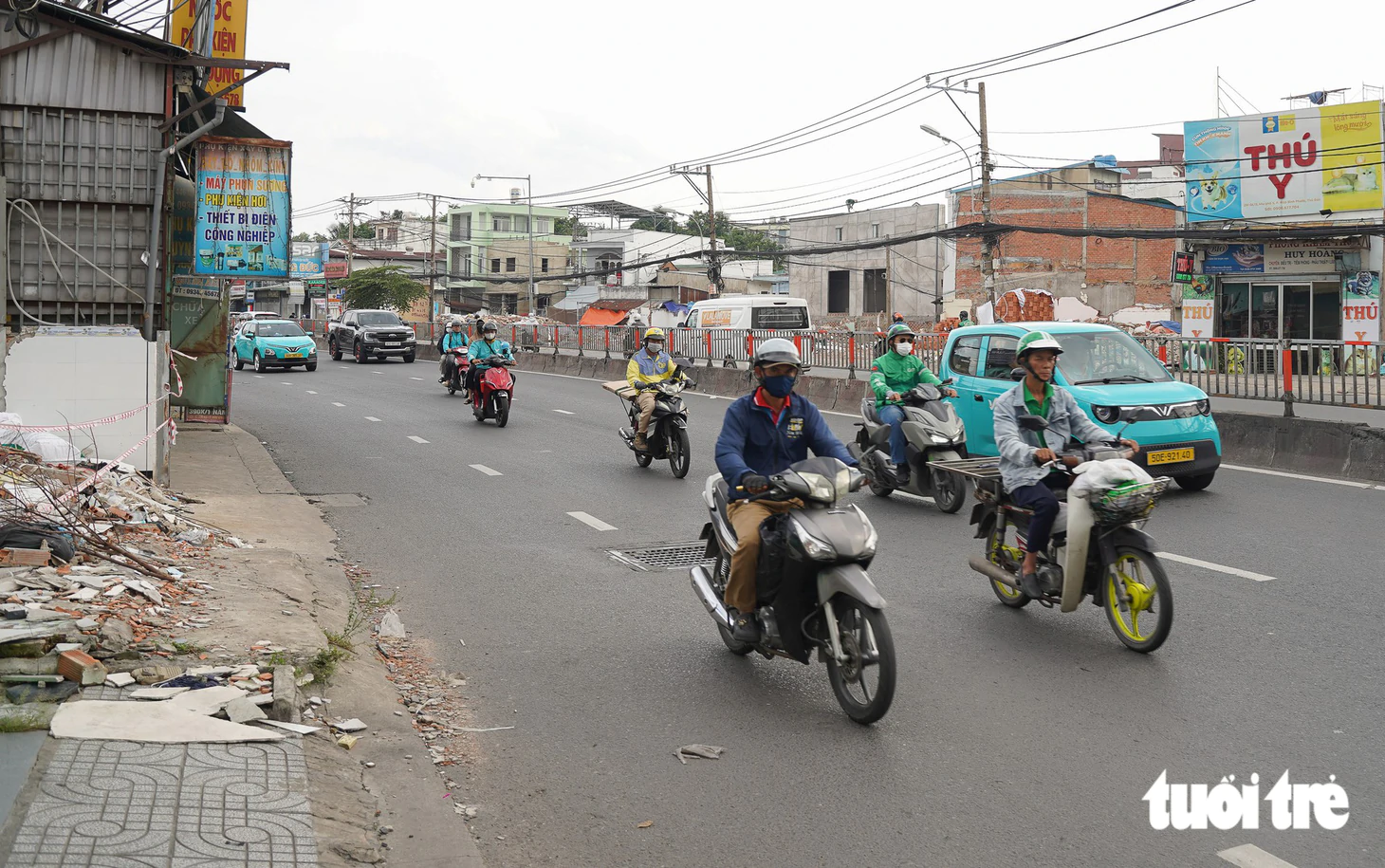 Người dân tất bật dọn nhà, nhường mặt bằng mở rộng Quốc lộ 13 trước ngày khởi công - Ảnh 13.