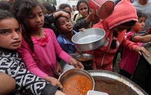UN says more food needed in Gaza as looting hampers deliveries - Ảnh 7.