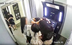 Man criminally detained for beating up woman in front of children at Hanoi apartment building- Ảnh 4.