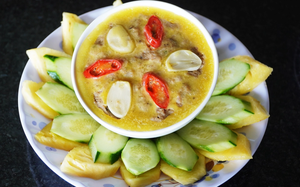 Hue-style braised mackerel scads: A taste of care and tradition - Ảnh 3.