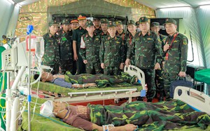 Remains of 2 Vietnamese soldiers found inside bomb casing in Laos - Ảnh 2.
