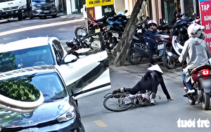 In Vietnam, Mercedes wedding car overturns into roadwork ditch, bride rescued - Ảnh 2.