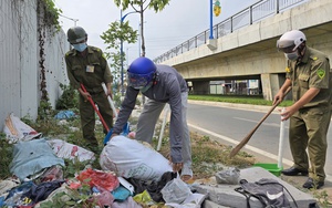 Two fined over $110 for illegal dumping in Ho Chi Minh City, ordered to clean up site - Ảnh 3.