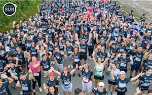 Over 14,500 local, int’l runners explore Hanoi’s heritage on marathon route- Ảnh 2.