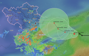 Tropical depression may strengthen into storm near northern Vietnam - Ảnh 2.