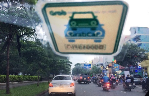 Cởi trói cho taxi truyền thống để được giống Uber - Grab - Ảnh 1. Cởi trói cho taxi truyền thống để được giống Uber - Grab - Ảnh 1.