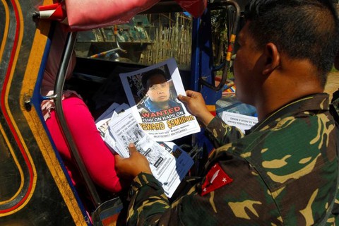 Ông Duterte nói dùng súng Trung Quốc giết trùm khủng bố - Ảnh 1. Ông Duterte nói dùng súng Trung Quốc giết trùm khủng bố - Ảnh 1.