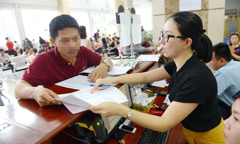 Nhiều rắc rối do trùng số CMND - Ảnh 1. Nhiều rắc rối do trùng số CMND - Ảnh 1.