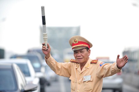 Câu chuyện của người cảnh sát 20 năm điều tiết giao thông - Ảnh 1. Câu chuyện của người cảnh sát 20 năm điều tiết giao thông - Ảnh 1.