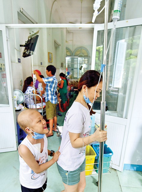 Nỗi đau không dập tắt được tiếng cười của em - Ảnh 2. Nỗi đau không dập tắt được tiếng cười của em - Ảnh 2.