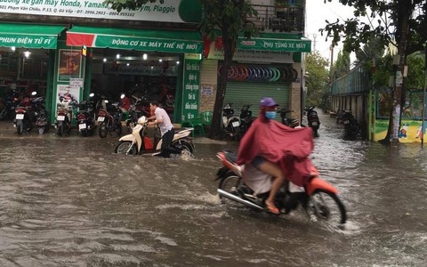 Dù áp thấp tan, Nam bộ tiếp tục mưa dông - Ảnh 1. Dù áp thấp tan, Nam bộ tiếp tục mưa dông - Ảnh 1.