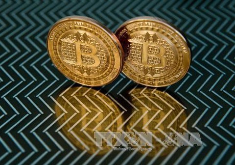 Giá trị đồng tiền ảo Bitcoin vượt mốc kỷ lục 10.000 USD - Ảnh 1. Giá trị đồng tiền ảo Bitcoin vượt mốc kỷ lục 10.000 USD - Ảnh 1.