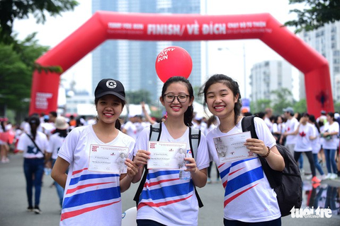 Gần 20.000 người tham gia chạy bộ từ thiện tại TP.HCM - Ảnh 14. Gần 20.000 người tham gia chạy bộ từ thiện tại TP.HCM - Ảnh 14.