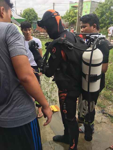 Một phụ nữ bị nước cuốn xuống cống tử vong - Ảnh 2. Một phụ nữ bị nước cuốn xuống cống tử vong - Ảnh 2.