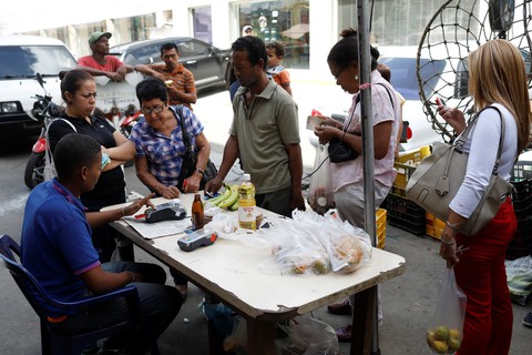 Ban lãnh đạo Venezuela khẳng định vẫn đảm bảo trả nợ - Ảnh 4. Ban lãnh đạo Venezuela khẳng định vẫn đảm bảo trả nợ - Ảnh 4.