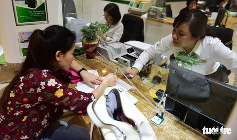Các ngân hàng khó thoái vốn để giảm sở hữu chéo - Ảnh 1. Các ngân hàng khó thoái vốn để giảm sở hữu chéo - Ảnh 1.