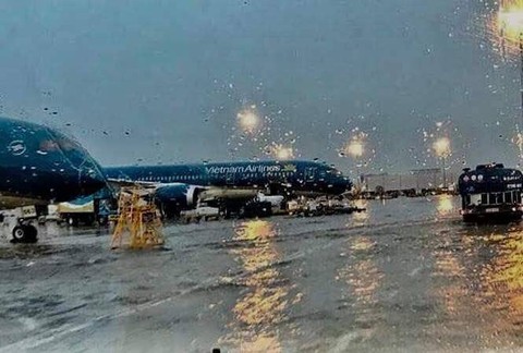 Không có chuyện sân bay Tân Sơn Nhất ngập nước - Ảnh 1. Không có chuyện sân bay Tân Sơn Nhất ngập nước - Ảnh 1.