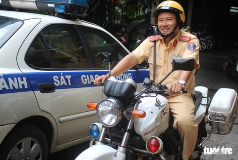 Gặp CSGT bắt cướp trong bộ ảnh nổi tiếng 11 năm trước - Ảnh 4. Gặp CSGT bắt cướp trong bộ ảnh nổi tiếng 11 năm trước - Ảnh 4.