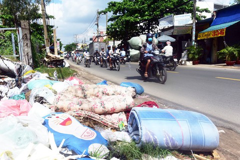 Coi chừng mầm bệnh rình rập sau mưa ngập - Ảnh 1. Coi chừng mầm bệnh rình rập sau mưa ngập - Ảnh 1.