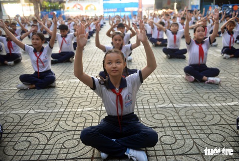 Học trò Sài Gòn thích thú tập thể dục với nhạc võ Vovinam - Ảnh 8. Học trò Sài Gòn thích thú tập thể dục với nhạc võ Vovinam - Ảnh 8.