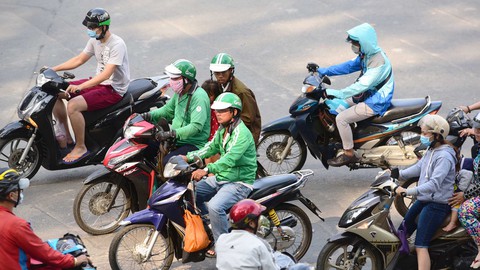 Grab sắp bị phạt vì vụ mua lại Uber? - Ảnh 1. Grab sắp bị phạt vì vụ mua lại Uber? - Ảnh 1.