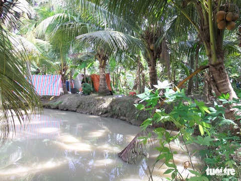 Nghi phạm giết vợ dìm dưới ao ở Trà Vinh đã tử vong - Ảnh 1. Nghi phạm giết vợ dìm dưới ao ở Trà Vinh đã tử vong - Ảnh 1.