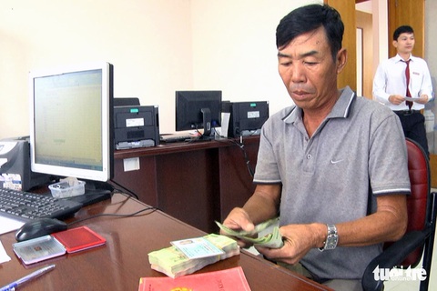Chi trả tiền hỗ trợ cho người dân nuôi cá lồng bè trên sông La Ngà - Ảnh 2. Chi trả tiền hỗ trợ cho người dân nuôi cá lồng bè trên sông La Ngà - Ảnh 2.