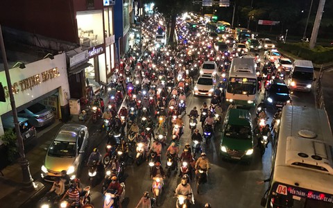 Bộ GTVT ủng hộ mở rộng Grab Taxi - Ảnh 1. Bộ GTVT ủng hộ mở rộng Grab Taxi - Ảnh 1.