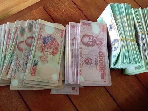 Bao lì xì in hình tiền Việt Nam liệu có vi phạm pháp luật - Ảnh 2. Bao lì xì in hình tiền Việt Nam liệu có vi phạm pháp luật - Ảnh 2.
