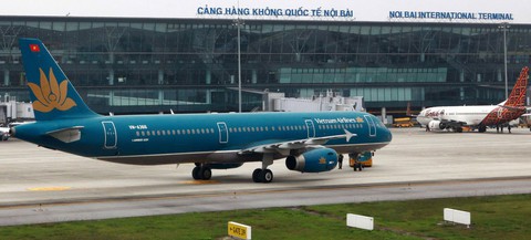 Nội Bài sử dụng sân đỗ quân sự phục vụ máy bay dịp tết - Ảnh 1. Nội Bài sử dụng sân đỗ quân sự phục vụ máy bay dịp tết - Ảnh 1.